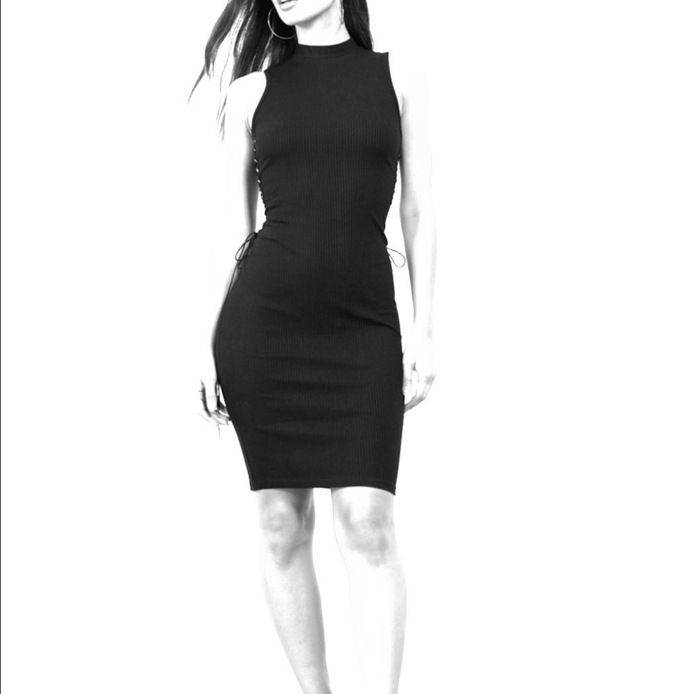 High neck black dress. Open back